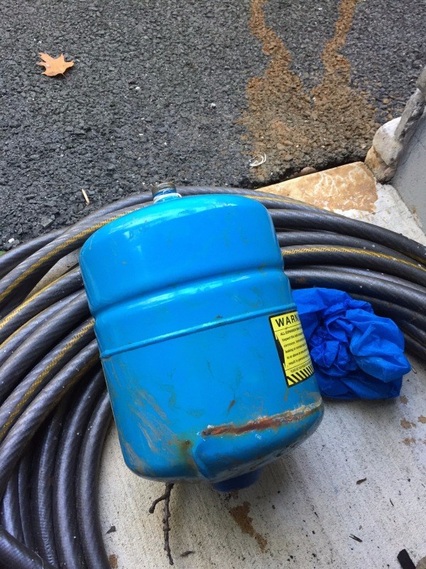 Water heater expansion tank burst causing significant damage to the surrounding property