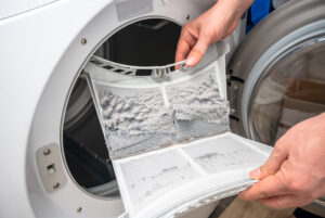 Removing lint from a vent and providing regular maintenance can help prevent dryer fires. 