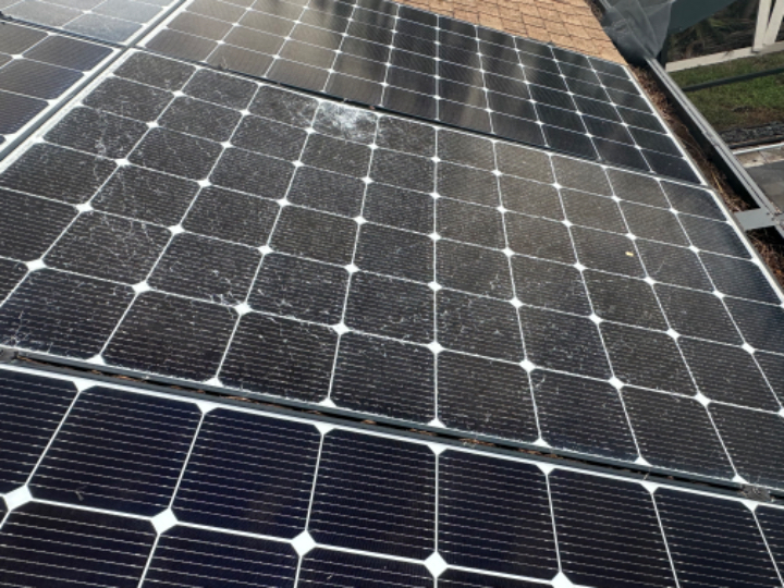 This solar panel shattered because of a wind-blown impact during hurricane conditions.